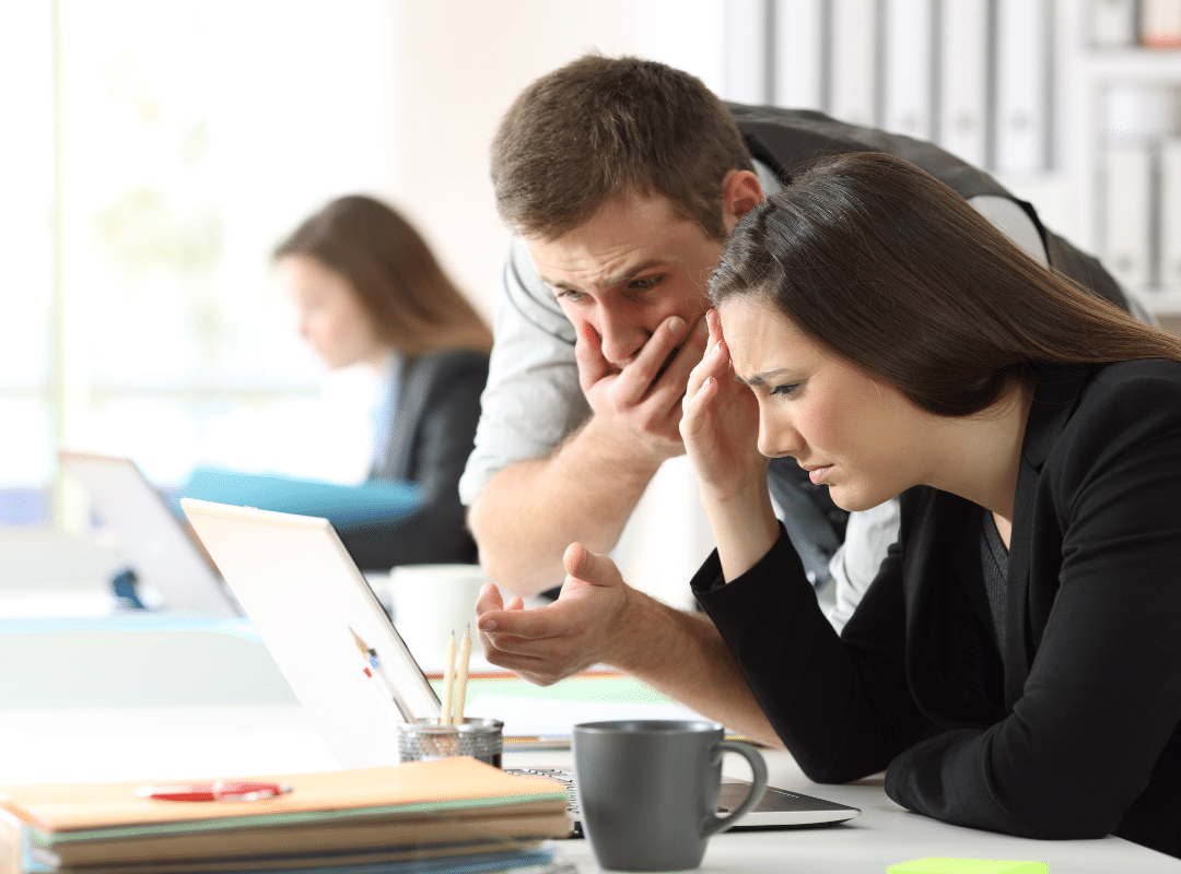 Worried-office-workers-checking-saw-offensive-content-online